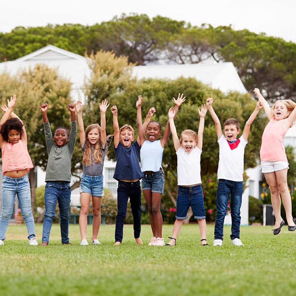 group-of-excited-elementary-school-pupils-standing-2023-11-27-05-27-43-utc